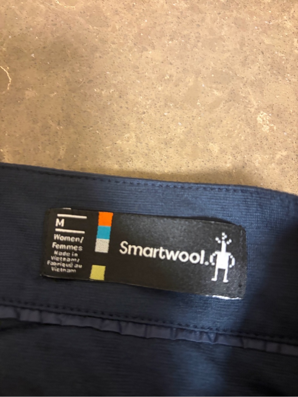 Smartwool Navy Quilted Packable skirt with Subtle Logo - Picture 3 of 4